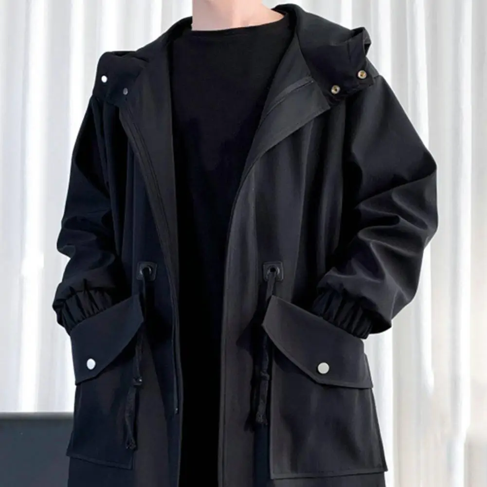 trench coat buttoned to the top